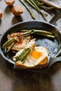 Fried eggs on a toasted bread in a metal pan. Royalty Free Stock Photo