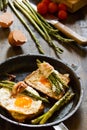 Fried eggs on a toasted bread in a metal pan. Royalty Free Stock Photo