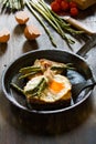 Fried eggs on a toasted bread in a metal pan. Royalty Free Stock Photo