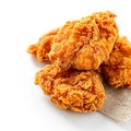 Fried excellence Crispy chicken photographed against a simple white background