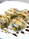 Fried exquisite sushi rolls with sweet sauce Royalty Free Stock Photo