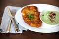 Fried fish in beer batter with cucumber yoghurt dip and sumac