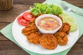 Fried fish cake and vegetables on plate, Thai food Royalty Free Stock Photo