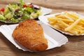 Fried fish and chips on a paper tray Royalty Free Stock Photo