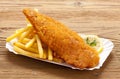 Fried fish and chips on a paper tray Royalty Free Stock Photo