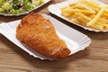 Fried fish and chips on a paper tray Royalty Free Stock Photo