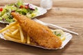 Fried fish and chips on a paper tray Royalty Free Stock Photo