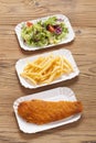 Fried fish and chips on a paper tray Royalty Free Stock Photo