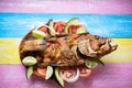 Fried fish on colorful background Royalty Free Stock Photo