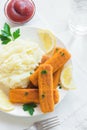 Fried fish fingers, mashed potatoes Royalty Free Stock Photo