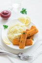 Fried fish fingers, mashed potatoes Royalty Free Stock Photo