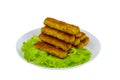 Fried fish fingers on a plate with lettuce isolated on white background Royalty Free Stock Photo