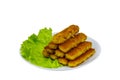 Fried fish fingers on plate with lettuce isolated on white background Royalty Free Stock Photo