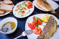 Fried fish with fresh herbs and lemon Royalty Free Stock Photo