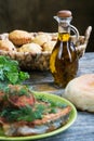 Fried fish with greens and olive oil Royalty Free Stock Photo