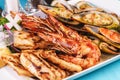 Fried fish, king prawns with lemon, mussels with oyster sauce, colmar rings, crab meat Royalty Free Stock Photo