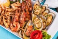 Fried fish, king prawns with lemon, mussels with oyster sauce, colmar rings, crab meat Royalty Free Stock Photo
