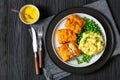 fried fish with mashed potatoes and green peas Royalty Free Stock Photo