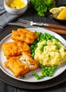 fried fish with mashed potatoes and green peas Royalty Free Stock Photo