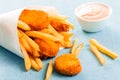 Fried fish nuggets with French fries Royalty Free Stock Photo