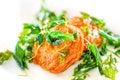 fried fish patty or fried fish paste ball tod mun pla with crispy basil leaf on top on white background, top view