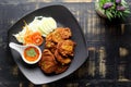 Fried fish patty or Thai Fish cake Tod mun pla on dark background