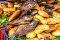 Fried fish & potatoes on streetside stall, Santiago Sacatepequez, Guatemala Royalty Free Stock Photo