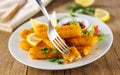 Fried fish sticks with a fork Royalty Free Stock Photo