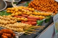 Fried food sausages and meat balls with sticks Thai style food, Thailand street food Bangkok Royalty Free Stock Photo