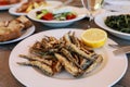 Fried fresh anchovies in the greek tavern.