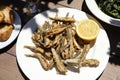 Fried fresh anchovies in the greek tavern.