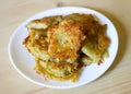 Fried fresh crispy potato pancakes on a plate. Royalty Free Stock Photo