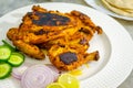 Fried Full Chicken on a plate