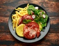 Fried Gammon steak with pineapple, french fries and vegetables Royalty Free Stock Photo