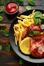 Fried Gammon steak with pineapple, french fries and vegetables Royalty Free Stock Photo