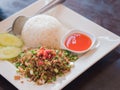 Fried garlic with rice and pepper sauce.