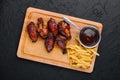 Fried glazed chicken wings and legs