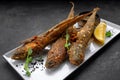 Fried Goby fish, with sauce and lemon