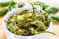 Fried Green Padron Peppers in White Bowl