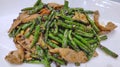 Fried green string beans with pork on the white plate Royalty Free Stock Photo