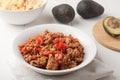 Fried ground meat with tomatoes for tacos