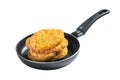 Fried Hash brown potato, hashbrown fritters in a skillet. Isolated, white background.