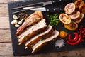 Fried homemade pork brisket with baked potatoes close-up on a ta Royalty Free Stock Photo