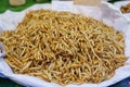 Fried insects mealworms or silk worms for snack, Thai food at market