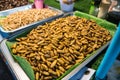 Fried Insects - Silkworm Pupa and Worms Molitors, on a vendor stall Royalty Free Stock Photo