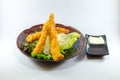 Fried Japanese Shrimp in black dish on white background