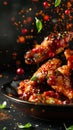 Fried juicy chicken wings, delicious juicy chicken wings with spices and sauce close-up Royalty Free Stock Photo