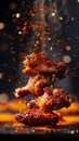 Fried juicy chicken wings, delicious juicy chicken wings with spices and sauce close-up Royalty Free Stock Photo