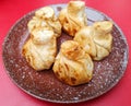 Fried khinkali on a red table Royalty Free Stock Photo