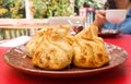 Fried khinkali on a red table Royalty Free Stock Photo
